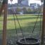 Single Swing (BNS 90cm) con seduta simile a un pneumatico in un’area giochi
