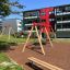 Bench, Steel Construction in un moderno parco giochi con edifici residenziali sullo sfondo