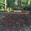 Attrezzo fitness outdoor chiamato OverĂ˘â‚¬under in un parco alberato.