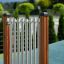 Strumento musicale da parco giochi Tube Bells con pali in legno per esterni.