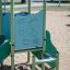 Mars playhouse with slide in un parco giochi.