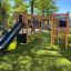 Attrezzatura da parco giochi all'aperto Challenger Nature II con scivolo e struttura da arrampicata.