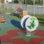 Gioco da parco Baby Dragon rocking su piattaforma a molla.