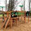 Jungle castle with slide in un parco giochi