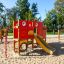 Struttura da arrampicata per parco giochi Big Truck single slide nei colori rosso e giallo.