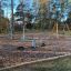 Parco giochi per bambini con la struttura in acciaio Cassiopeia e altalene in legno