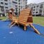 Galapagos wooden playhouse with slide in una moderna area residenziale