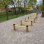 Agility Mini Jump Bars utilizzato in un percorso di allenamento all'aperto per cani.