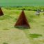 Set da parco giochi Tipi Nature wooden house su campo erboso