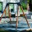 Bird Nest Single Swing (BNS 120 cm) installato in un parco giochi.