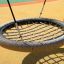 Bird Nest Single Swing (BNS 120 cm) in un parco giochi.