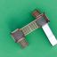 Parco giochi Mini Play II per bambini con strutture di arrampicata in legno e scivolo in metallo su superficie verde