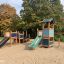 Parco giochi con Locomotive w/ Tower and Slide train playhouse.