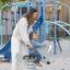 Altalena a molla da parco giochi a forma di tricheco per bambini
