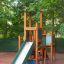 Tower with Slide struttura da gioco in legno con pareti da arrampicata e scivolo verde