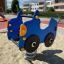 Car rocking nella sabbiera del parco giochi in zona residenziale