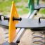 Attrezzatura da parco giochi Double Pony rocking con sedili gialli e verdi su molle