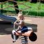 Bike rocking dondolo a molla per parco giochi con seduta in legno e maniglie in metallo