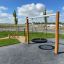 Attrezzatura da parco giochi Single Swing con seduta a pneumatico in un contesto di parco