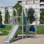 Observatory with a slide attrezzatura per parco giochi in un'area residenziale