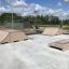 Skatepark con Olly Box 3 in una giornata di sole.