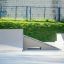Rampa da skatepark Combination 6 con vegetazione e recinzione sullo sfondo.