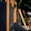 Attrezzatura da parco giochi in legno Romping Center Nature con scivolo