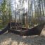Nave da parco giochi in legno con scivolo nel bosco, nome del prodotto: Small Ship Nature.