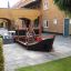 Struttura in legno per parco giochi Small Ship Nature in un cortile
