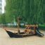 Struttura in legno per parco giochi a forma di Small Ship Nature con scivolo e struttura da arrampicata.