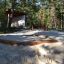 Sandbox with bark in un parco giochi nel bosco