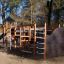 King-Kong Nature castle with slide in un parco giochi circondato da alberi