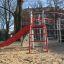 Struttura da parco giochi in acciaio con scivolo rosso - Whale AZTEC.