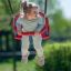 Bambino che si diverte su un Baby Double Swing all'aperto