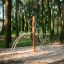 Struttura per arrampicata da parco giochi Kilimanjaro steel structure in un ambiente boschivo.