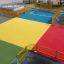 Parco giochi colorato con sezioni separate per diverse attività sportive, Maracana.