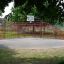 Olimpico area giochi con canestro da basket e area recintata