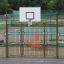 Canestro da basket all'aperto con recinzione metallica di sicurezza - attrezzatura da gioco Tiger.