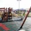 Parco giochi con Rubber Tiles 45 in un ambiente esterno.