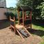 Casetta di legno per bambini con parete da arrampicata - Playhouse Nature.