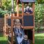 Bambini che giocano sul set da gioco in legno Country House Nature