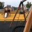 Knight's Castle Nature playhouse with slide in un parco giochi
