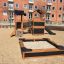 Knight's Castle Nature playhouse with slide e sabbiera nell'area giochi