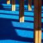 Gambe in legno dell'attrezzatura da parco giochi su una superficie blu.