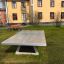 Concrete table tennis, free-standing in un contesto di parco.