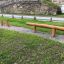 Trave di equilibrio in legno e ceppi da salto per parco giochi all'aperto
