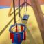 Swing Frame (double swing) nel parco giochi con seduta blu e seggiolino di sicurezza per bambini.