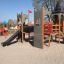 Struttura da parco giochi a forma di castello con scivoli e torri - Camelot castle with slide.