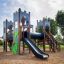 Parco giochi Camelot castle with slide.