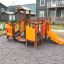 Rubik playhouse with slide in un parco giochi residenziale